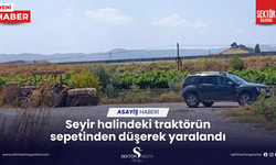 Seyir halindeki traktörün sepetinden düşerek yaralandı