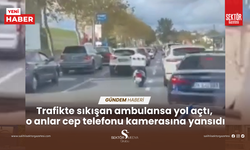 Trafikte sıkışan ambulansa yol açan motosikletli kurye büyük beğeni toplandı