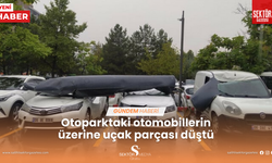 Otoparktaki otomobillerin üzerine uçak parçası düştü