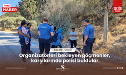 Organizatörleri bekleyen göçmenler, karşılarında polisi buldular