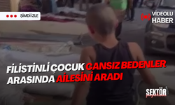 Filistinli çocuk cansız bedenler arasında ailesini aradı