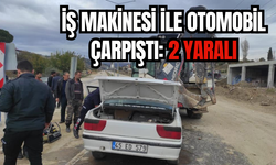 Otomobil geri manevra yapan iş makinesine çarptı: 2 yaralı