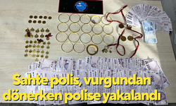 Sahte polis, vurgundan dönerken polise yakalandı