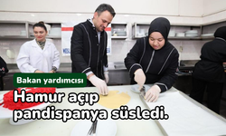 Bakan yardımcısı, hamur açıp pandispanya süsledi.