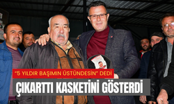 5 yıldır başımın üstündesin dedi, çıkarttı kasketini gösterdi