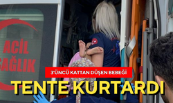 3'üncü kattan düşen bebeği tente kurtardı