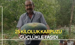 25 kiloluk karpuzu güçlükle taşıdı