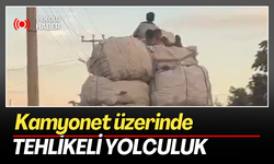 Kamyonet üzerinde tehlikeli yolculuk