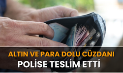 Altın ve para dolu cüzdanı polise teslim etti