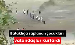 Bataklığa saplanan çocukları vatandaşlar kurtardı