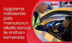 Uygulama noktasında polis memurunun alkollü sürücü ile imtihanı kamerada