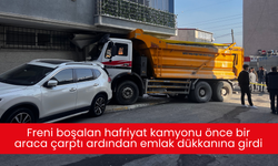 Freni boşalan hafriyat kamyonu önce bir araca çarptı ardından emlak dükkanına girdi