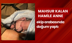 Kar yağışı ve tipi nedeniyle mahsur kalan hamile anne, ekip arabasında doğum yaptı