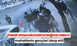 Sokak ortasında kadına bağıran adamı mahallenin gençleri darp etti