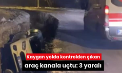 Kaygan yolda kontrolden çıkan araç kanala uçtu: 3 yaralı