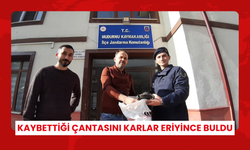 Kar yağışında kaybolan çanta, 1 ay sonra bulunarak sahibine verildi