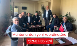 Muhtarlardan yeni koordinatöre çizme hediyesi