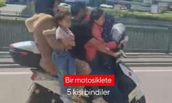 Bir motosiklete 5 kişi bindiler