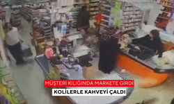 Müşteri kılığında markete girdi