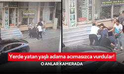 Yerde yatan yaşlı adama acımasızca vurdular! O anlar kamerada