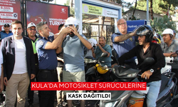 Kula’da motosiklet sürücülerine kask dağıtıldı