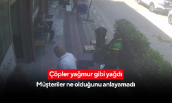 Kıraathane müşterilerinin üzerine balkonlardan çöp yağdı... O anlar kamerada