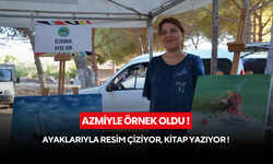 Azmiyle dikkat çekiyor ! Ayaklarıyla resim çiziyor, kitap yazıyor...