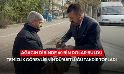 Ağacın dibinde 60 bin dolar buldu: Temizlik görevlisinin dürüstlüğü takdir topladı