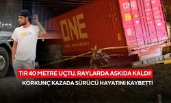 Tır 40 metre uçtu, raylarda askıda kaldı! Korkunç kazada sürücü hayatını kaybetti