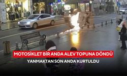 Saniyelerle kurtuldu: Alev alan motosikletten kendini attı