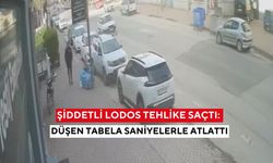 Şiddetli lodos tehlike saçtı: Düşen tabela saniyelerle atlattı