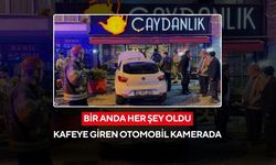 O anlar saniye saniye kaydedildi | Kontrolden çıkan otomobil kafeye daldı...