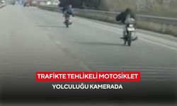 Trafikte tehlikeli motosiklet yolculuğu kamerada