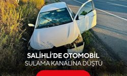 Salihli’de otomobil sulama kanalına düştü: Sürücü ölümden döndü