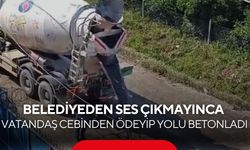 Belediyeden umudu kesen vatandaş cebinden para verip çukura beton döktürdü...