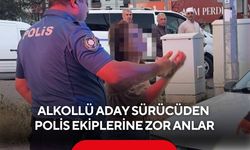 Alkollü aday sürücü ekiplere zor anlar yaşattı! Otomobilin çekileceğini anlayınca direndi...