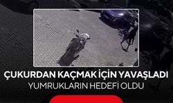 Çukurdan kaçmak için yavaşladı, yumrukların hedefi oldu! Trafikte akılalmaz saldırı...