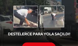 Destelerce para yola saçıldı! Rüzgar banknotları savurdu, o anlar kamerada