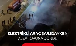 Şarjdaki elektrikli araç alev aldı! İtfaiyenin müdahalesi sırasında patladı... O anlar kamerada