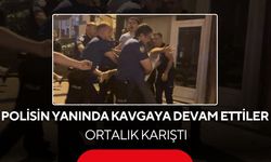 Polisin gözü önünde birbirlerine saldırdılar! Biber gazıyla etkisiz hale getirildiler...