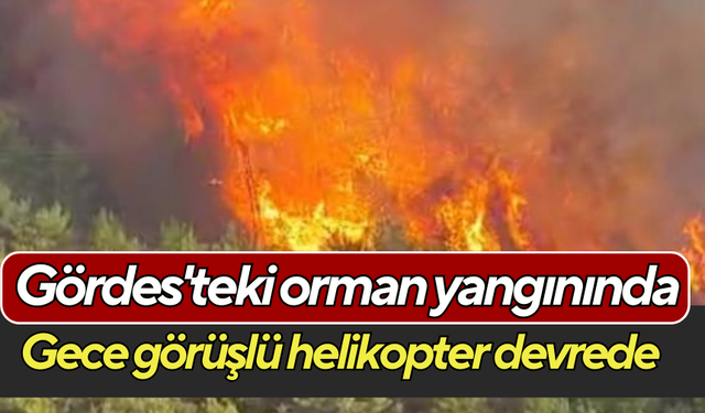 Gördes'teki orman yangınında gece görüşlü helikopter devrede