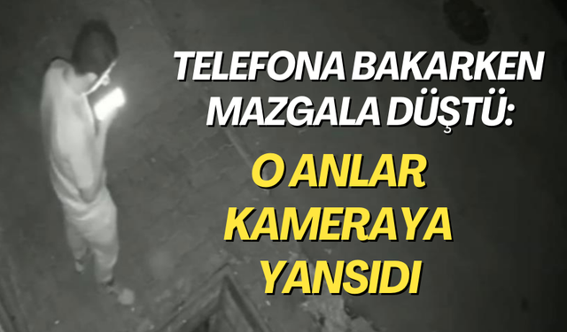 Telefona bakarken mazgala düştü: O anlar kameraya yansıdı