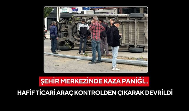 Manisa'da refüje çarpan araç devrildi, sürücü şans eseri yara almadı