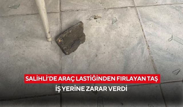 Salihli’de araç lastiğinden fırlayan taş iş yerine zarar verdi