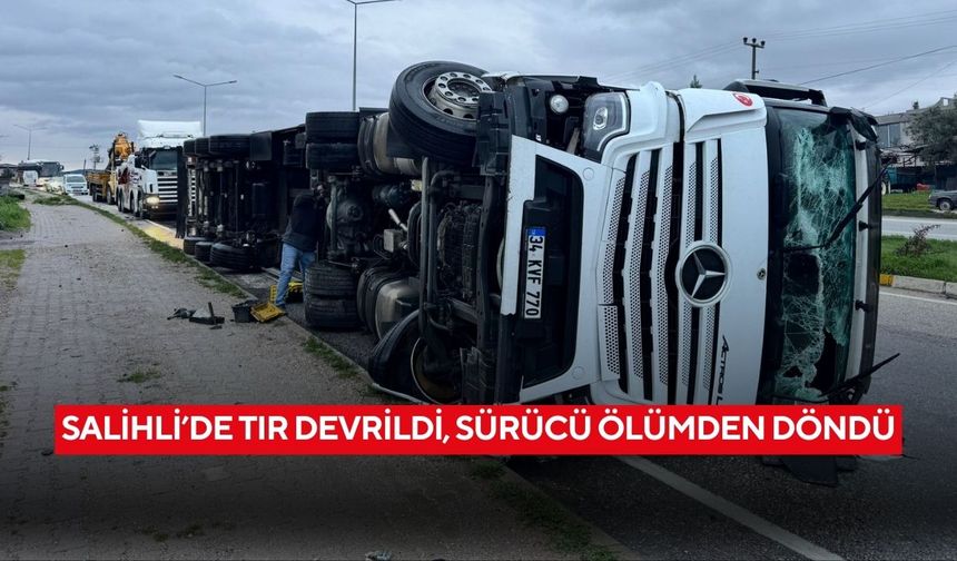 Salihli’de tır devrildi: Sürücü yaralandı, trafik tek şeritten verildi