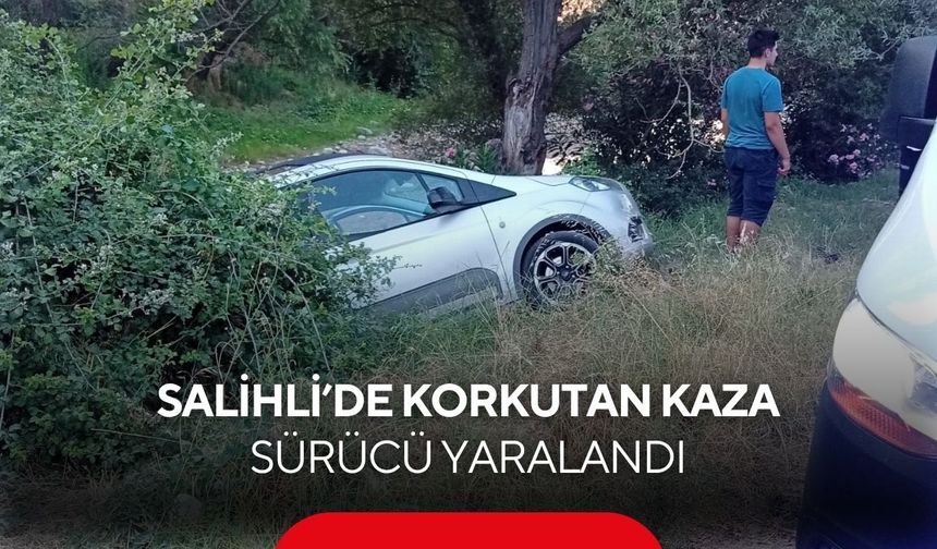 Salihli'de otomobil yol kenarına uçtu: Sürücü yaralandı